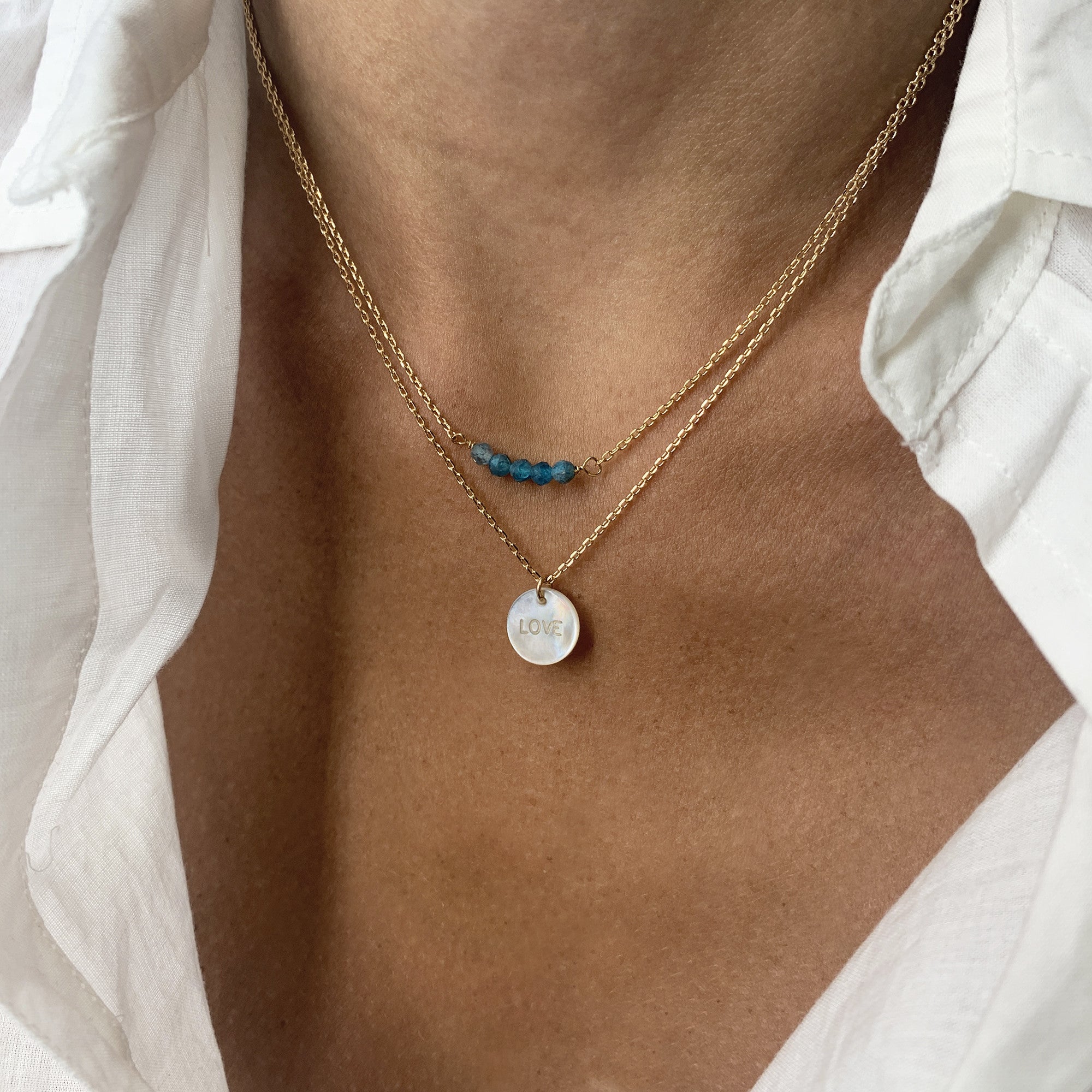 Mother-of-pearl love charm necklace